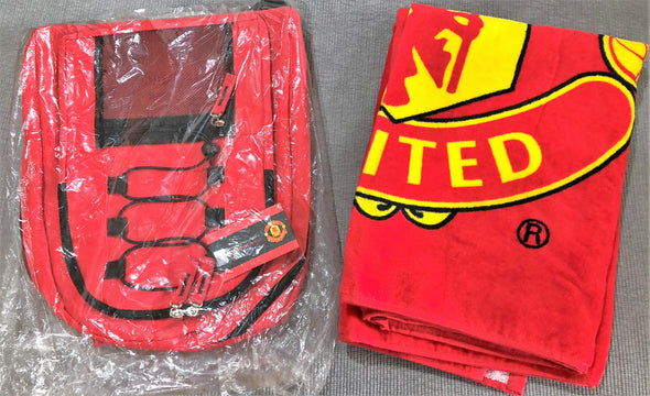Manchester United store backpack and towel