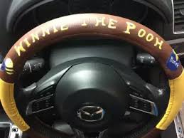 Superb Disney Pooh steering wheel cover